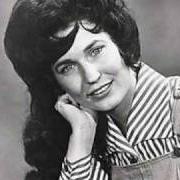 The lyrics THEN AND ONLY THEN of LORETTA LYNN is also present in the album Blue kentucky girl (1965)