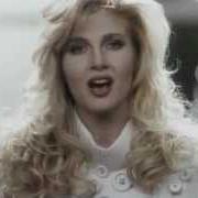 The lyrics SUGAR SUGAR of LORELLA CUCCARINI is also present in the album Lorel (1986)