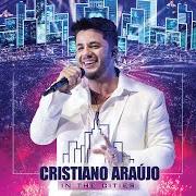 The lyrics É COM ELA QUE EU ESTOU of CRISTIANO ARAÚJO is also present in the album In the cities - ao vivo em cuiabá (2014)