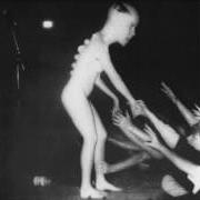 The lyrics DANCE OF THE COBRAS of BUTTHOLE SURFERS is also present in the album Live (1984)