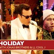 The lyrics MERRY HAPPY CHRISTMAS of JIMMY FALLON is also present in the album Holiday seasoning (2024)
